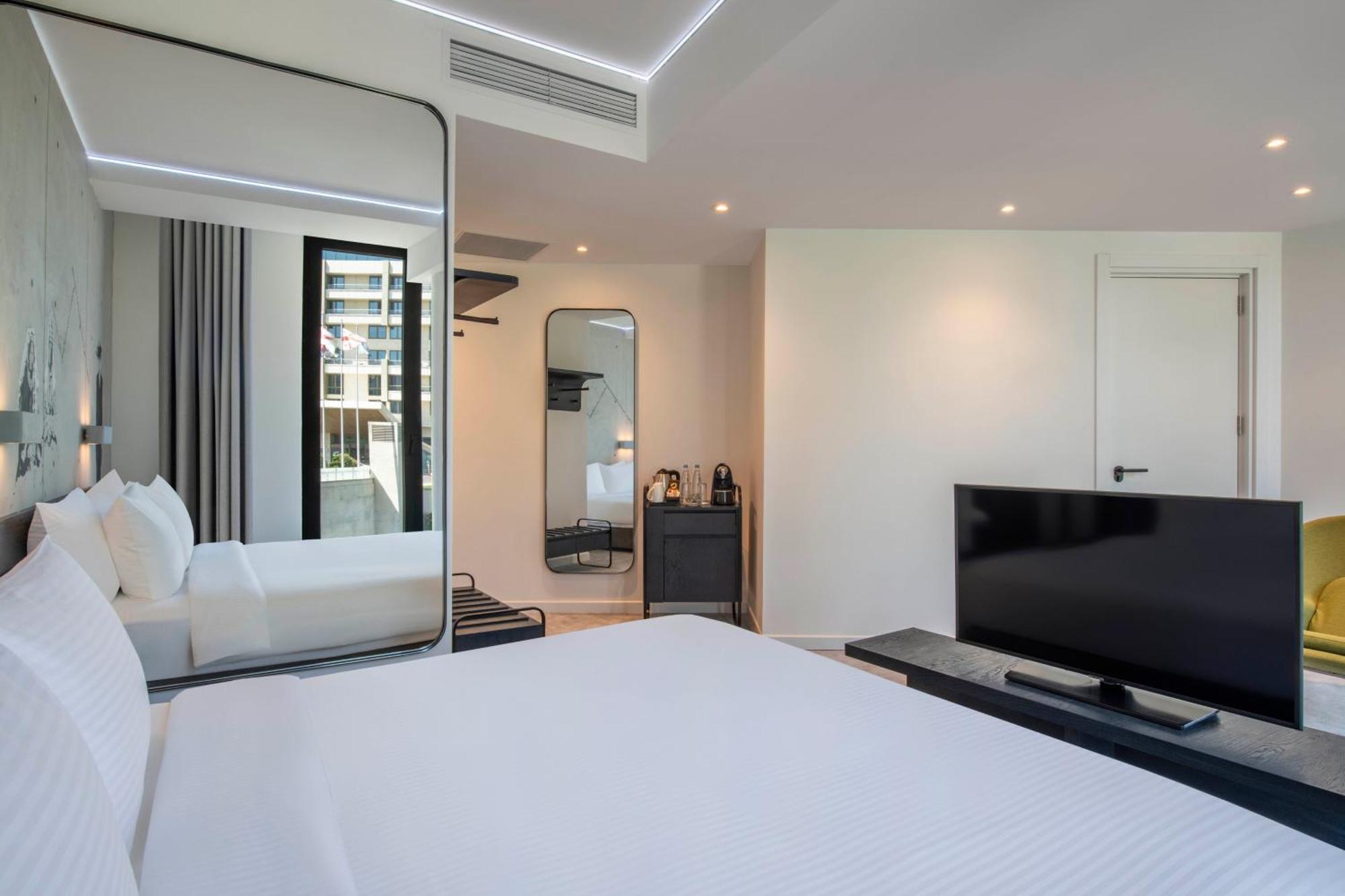 Golden Tulip Design Tbilisi Ξενοδοχείο Δωμάτιο φωτογραφία